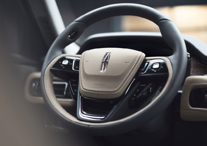 The intuitively placed controls of the steering wheel on a 2024 Lincoln Aviator® SUV | Preston Lincoln in Hurlock MD